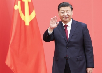 Xi Jinping, general secretary of the CPC Central Committee, waves to journalists at the Great Hall of the People in Beijing, Oct. 23, 2022. Chinese economy continues to remain in distress