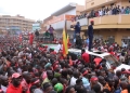 People go on top of buildings [finished and unfinished] to see Bobi Wine in Mbale City 6 Sept after thr streets got filled up with people (PHOTO/David Mafabi)