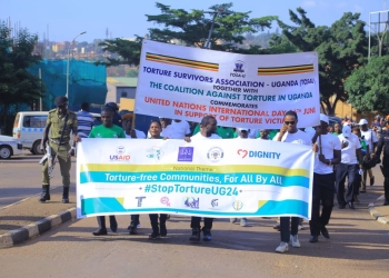 Some of the stakeholders marching on streets of Kampala ahead of the commemoration ceremony. (Courtesy photo)