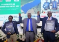 AidEnvironment's James Kisekka (left) with Uganda Breweries Managing Director Andrew Kilonzo (right) and Dr. Alfred Okidi, Permanent Secretary Ministry of Water & Environment after the project launch